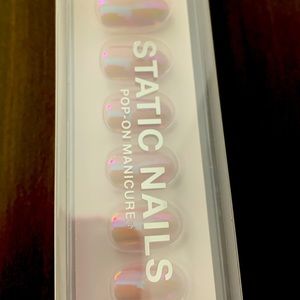 Brand new, never opened, Static Nails in “Doe”.